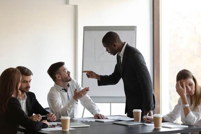 Male boss yelling at employee - Hostile Work Environment